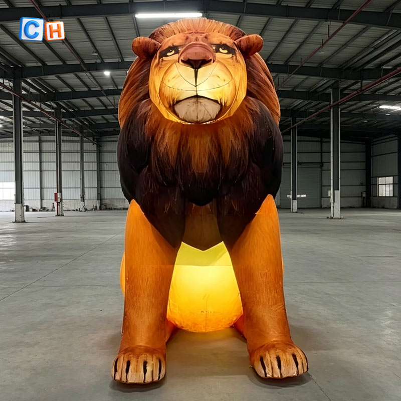 Giant realistic lighted inflatable lion model inside factory warehouse